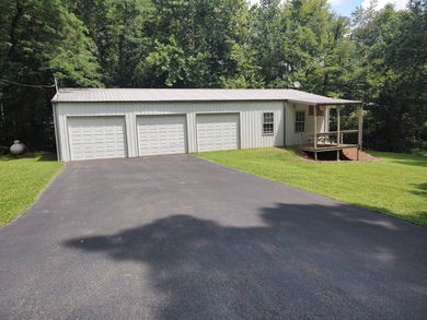 Located just minutes from Paris Landing State Park and Kentucky - photo 3