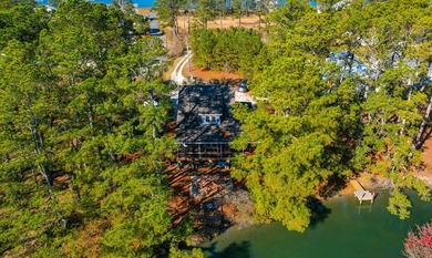 TURN KEY & FULLY FURNISHED. Beautiful custom coastal cottage