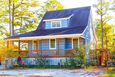 TURN KEY & FULLY FURNISHED. Beautiful custom coastal cottage