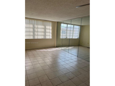 This affordable condominium is conveniently located near