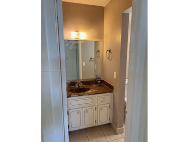 This affordable condominium is conveniently located near