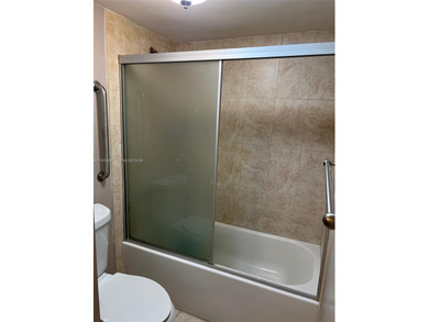 This affordable condominium is conveniently located near