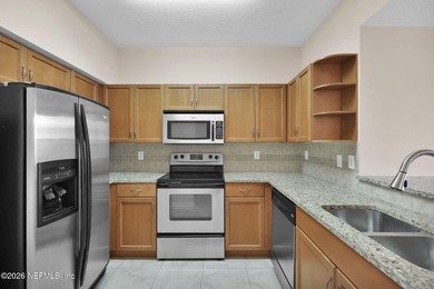 Discover urban living at its finest in this top-floor - photo 5