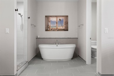 Welcome to an exceptional waterfront residence positioned in one - photo 40