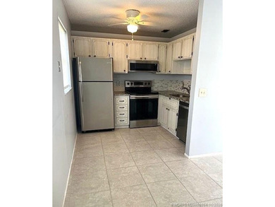 Beautifully tiled 2nd floor 2-bedroom 2-bath unfurnished condo - photo 2