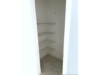 Beautifully tiled 2nd floor 2-bedroom 2-bath unfurnished condo - photo 8