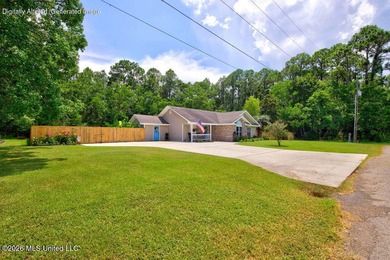 Welcome home to this inviting 4-bedroom, 2-bath home situated on - photo 2