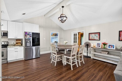 Welcome home to this inviting 4-bedroom, 2-bath home situated on - photo 8