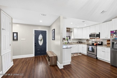 Welcome home to this inviting 4-bedroom, 2-bath home situated on - photo 10