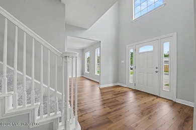 Beautifully updated 4-bedroom, 3-bath home located in the highly - photo 3