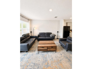 Light, bright and inviting! Built in 2022, this beautifully - photo 7