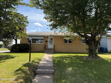 Perfectly situated on a corner lot with convenient access to