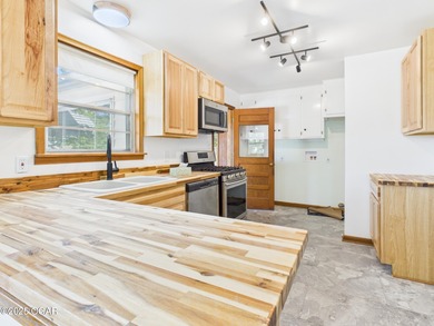 Perfectly situated on a corner lot with convenient access to