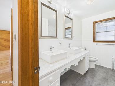 Perfectly situated on a corner lot with convenient access to