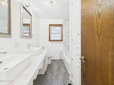 Perfectly situated on a corner lot with convenient access to