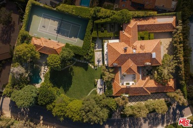 Hidden behind layers of mature landscaping and approached - photo 2