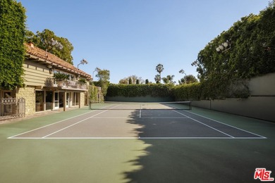 Hidden behind layers of mature landscaping and approached - photo 4
