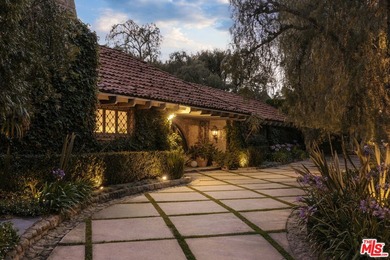 Hidden behind layers of mature landscaping and approached - photo 5