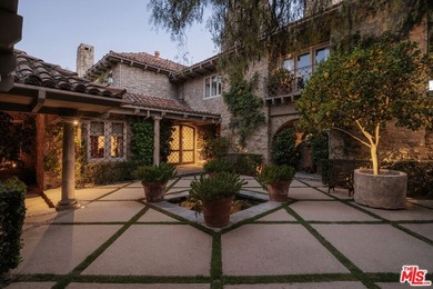 Hidden behind layers of mature landscaping and approached - photo 6