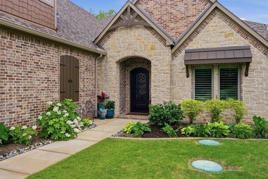 Welcome to refined lakeside living in the prestigious gated - photo 4