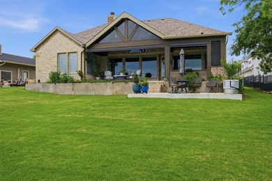 Welcome to refined lakeside living in the prestigious gated - photo 5