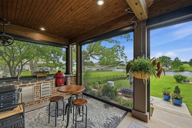 Welcome to refined lakeside living in the prestigious gated - photo 6