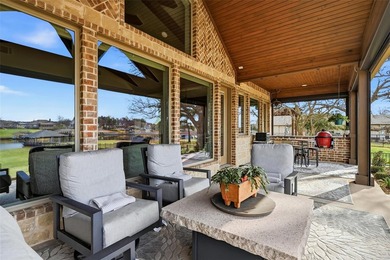 Welcome to refined lakeside living in the prestigious gated - photo 7