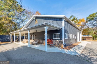 Experience a rare blend of privacy, acreage, and riverfront - photo 4