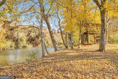 Experience a rare blend of privacy, acreage, and riverfront - photo 6