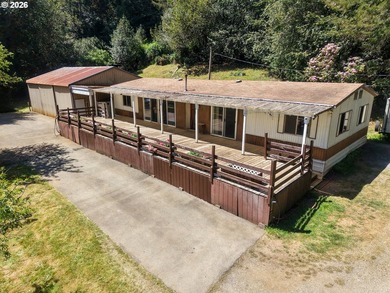 Welcome to Greene Acres. This 3-bedroom, 2-bath home sits on - photo 3