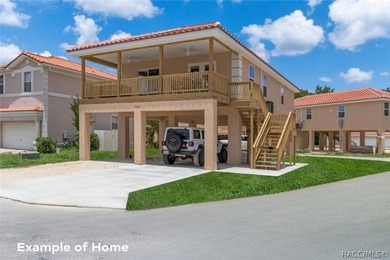 Pre-Construction. To be built. This beautiful stilt home located - photo 1