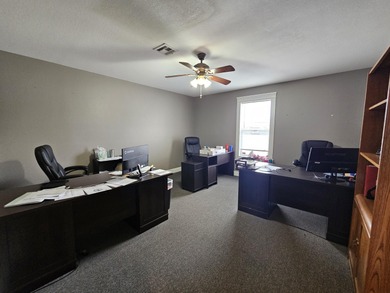 This is a very spacious office complex that can easily be made