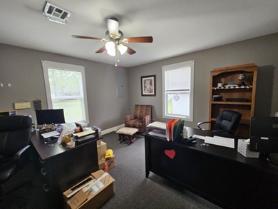 This is a very spacious office complex that can easily be made