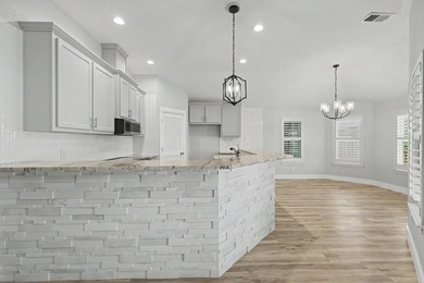 Welcome to waterfront living at its finest in the highly - photo 9