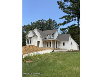 Welcome to this exceptional 5-bedroom, 4.5-bath home nestled in - photo 2