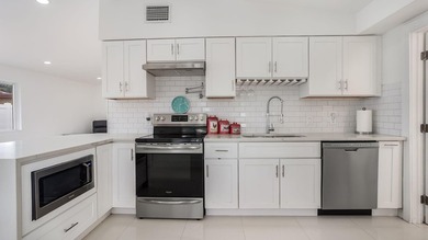 Beautifully Updated East Boca Home - No HOA! Welcome to this - photo 6