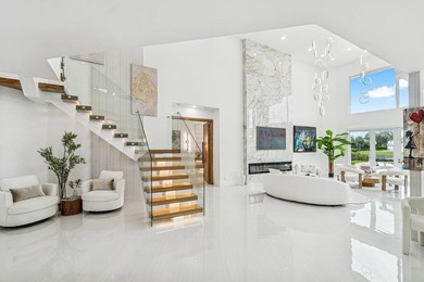 A striking, newly renovated two-story residence showcasing - photo 10