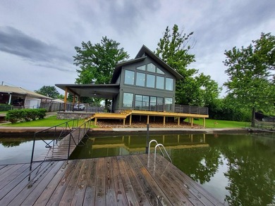 Lakefront living at its best is complete in this beautifully - photo 1