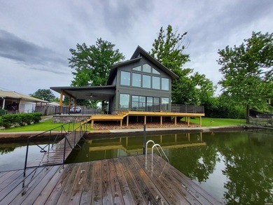 Lakefront living at its best is complete in this beautifully - photo 3
