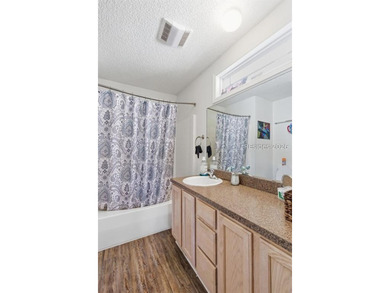 Welcome to this charming 4-bedroom, 2-bath home located in the - photo 19