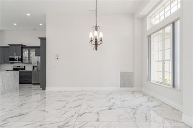 Welcome to this Ballantrae POOL home with golf and lake views - photo 8