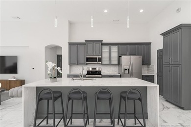 Welcome to this Ballantrae POOL home with golf and lake views - photo 9