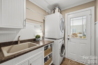 This beautifully maintained home with a deeded boat slip with a - photo 31