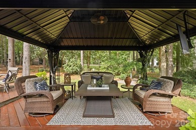 This beautifully maintained home with a deeded boat slip with a - photo 33