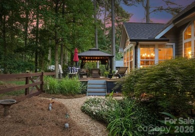 This beautifully maintained home with a deeded boat slip with a - photo 36
