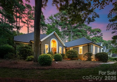 This beautifully maintained home with a deeded boat slip with a - photo 38