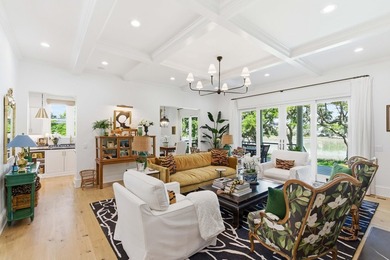 This elevated waterfront home with a private dock has been - photo 14