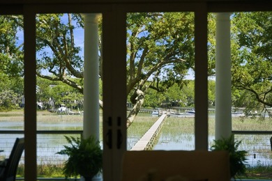 This elevated waterfront home with a private dock has been - photo 16