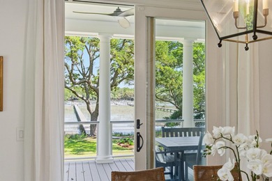 This elevated waterfront home with a private dock has been - photo 20