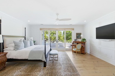 This elevated waterfront home with a private dock has been - photo 31